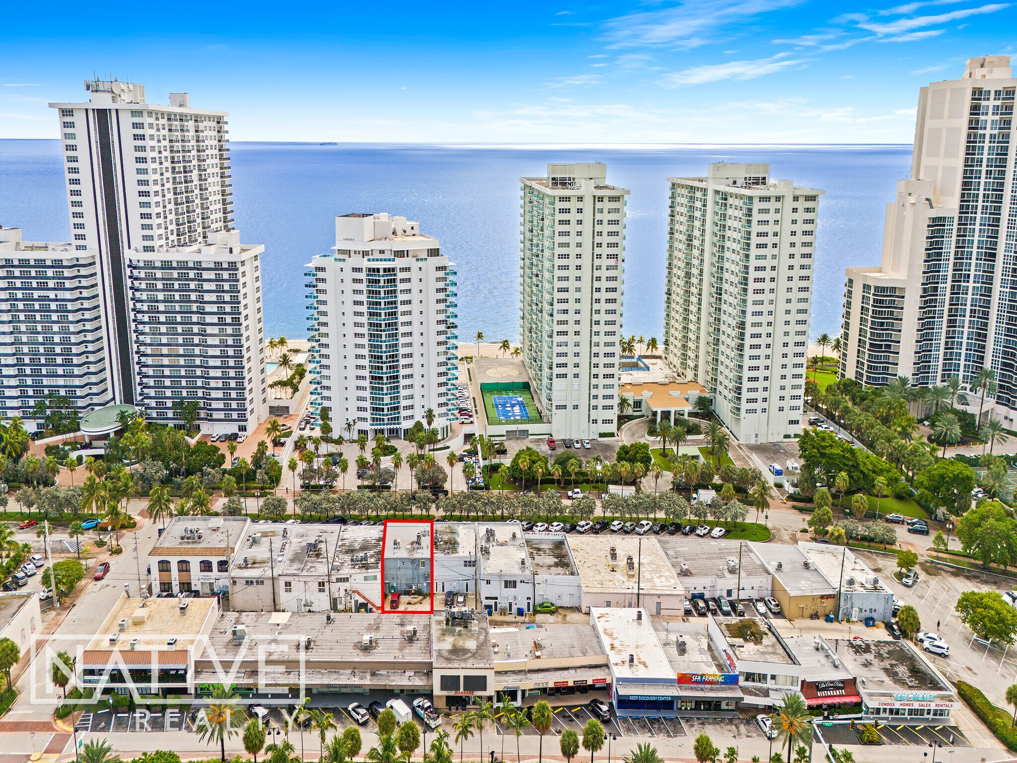 Close aerial view of 3425 Galt Ocean Drive showing the property and its oceanfront context